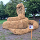 Illustration for article titled Straw Dinosaurs Appear in Japanese Fields, Try To Eat Humans